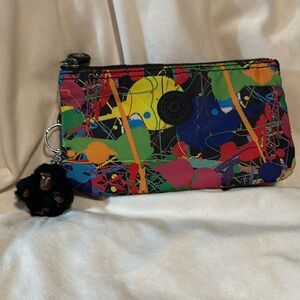 Kipling nylon expandable inner zipper pouch, never used